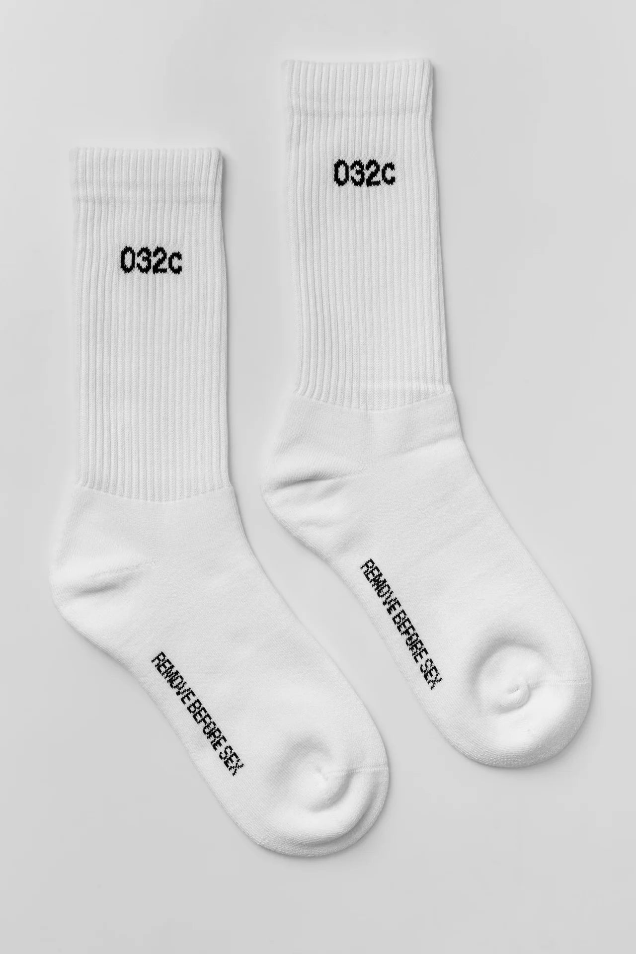 032c "REMOVE BEFORE SEX" Crew Socks White